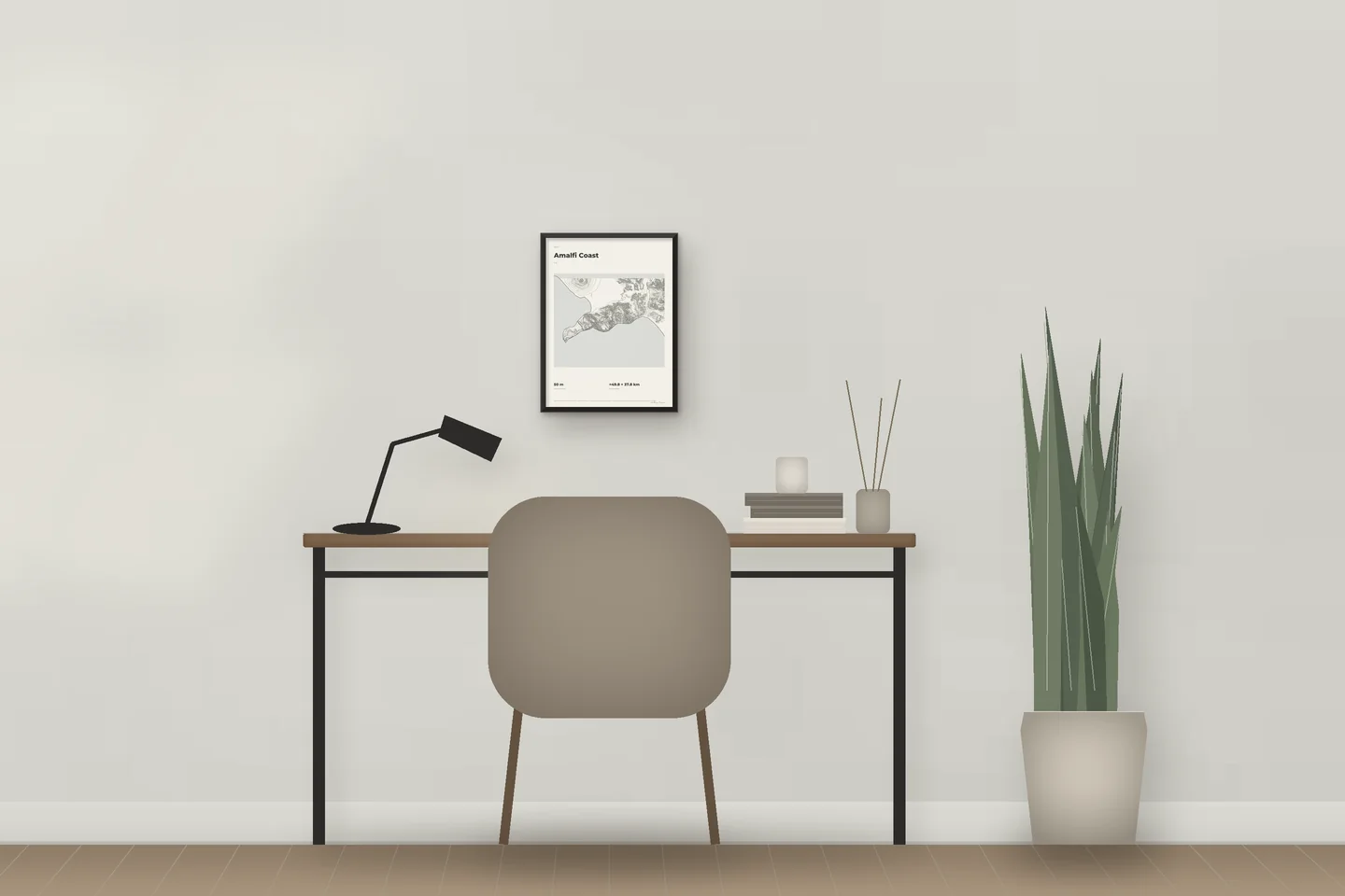 Amalfi Coast (12 × 16 in · Black metal · Ivory & Graphite) above a desk in a home office — illustrative digital preview, not a photo