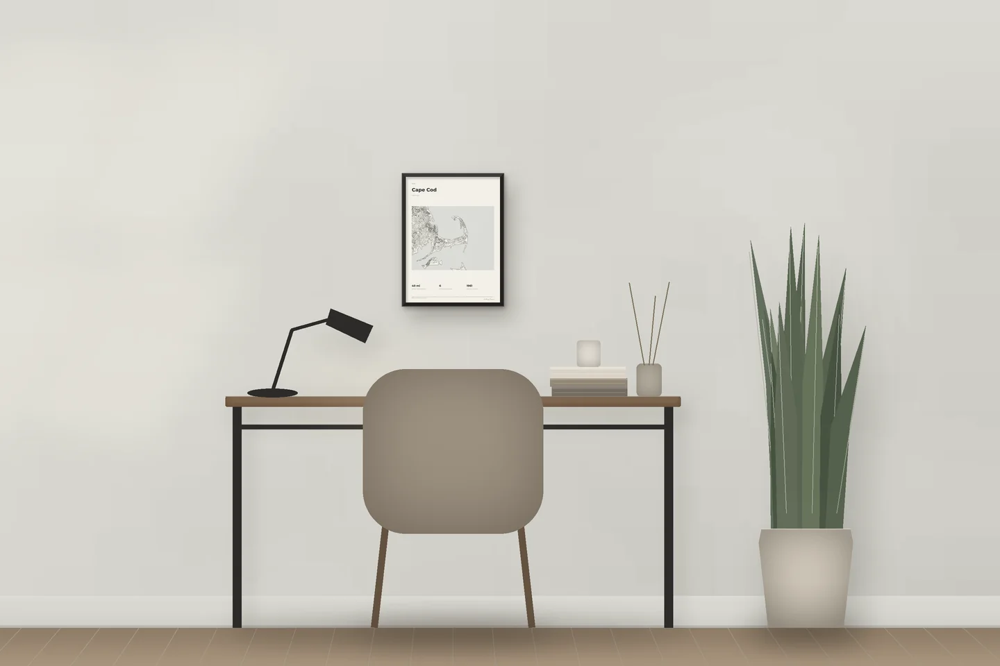 Cape Cod (12 × 16 in · Black metal · Ivory & Graphite) above a desk in a home office — illustrative digital preview, not a photo